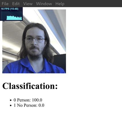 Model CPU TFLite berjalan di aplikasi Electron. Class ini mengklasifikasikan gambar dari webcam dan menampilkan nilai keyakinan untuk setiap class di bawah.